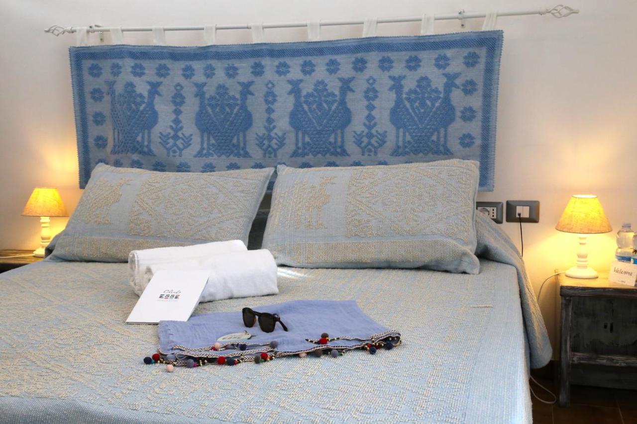 Club Esse Sporting Hotel Stintino Bagian luar foto