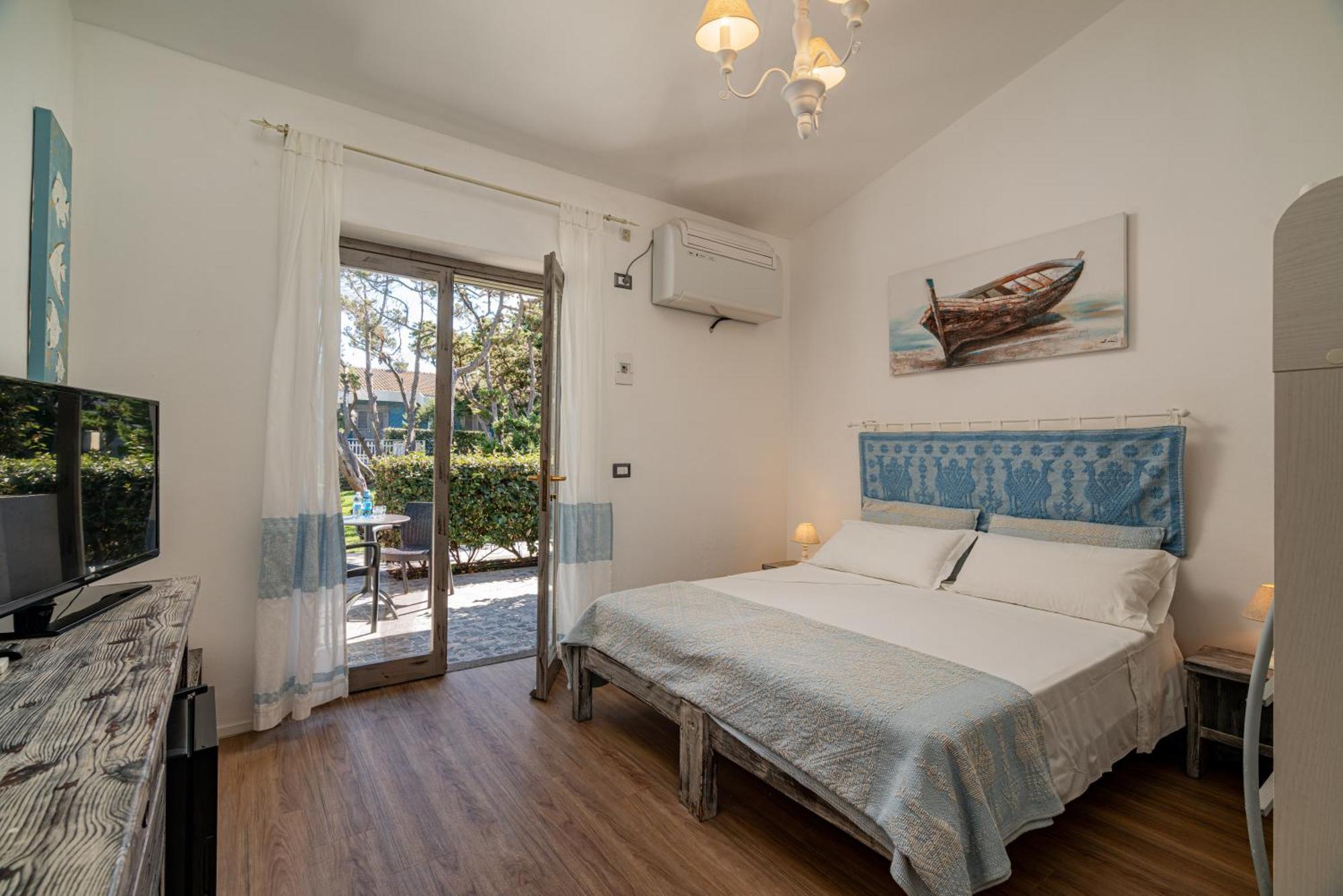 Club Esse Sporting Hotel Stintino Bagian luar foto