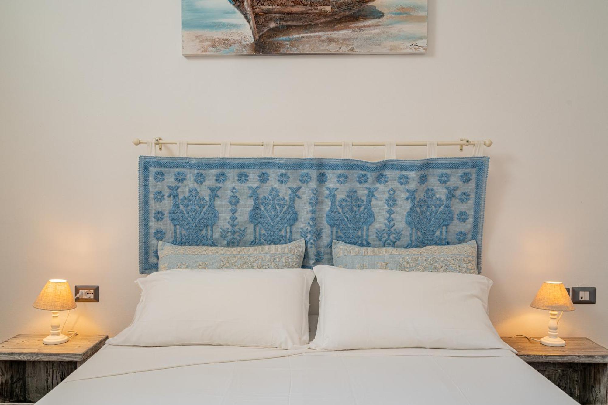 Club Esse Sporting Hotel Stintino Bagian luar foto