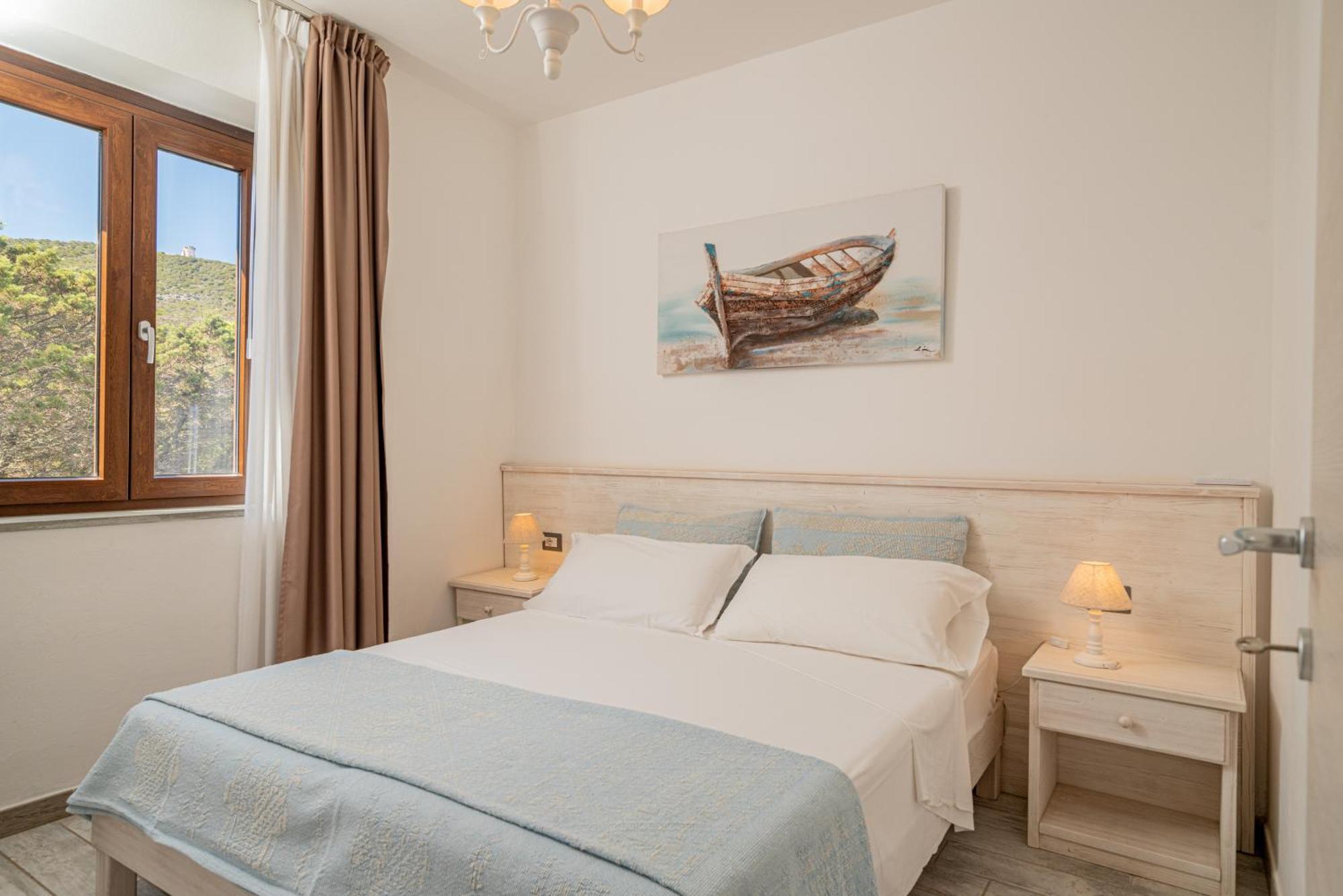 Club Esse Sporting Hotel Stintino Bagian luar foto